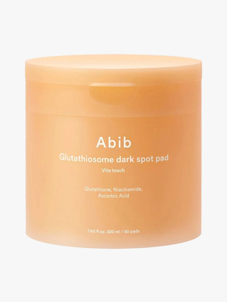 Abib Glutathiosome Dark Spot Pads orange jar on light gray background